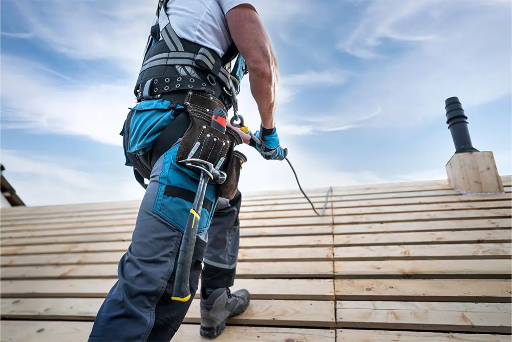 Safety gear for DIY roof repair.